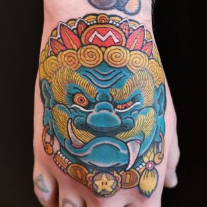 hand tattoo by will corvidae sparling