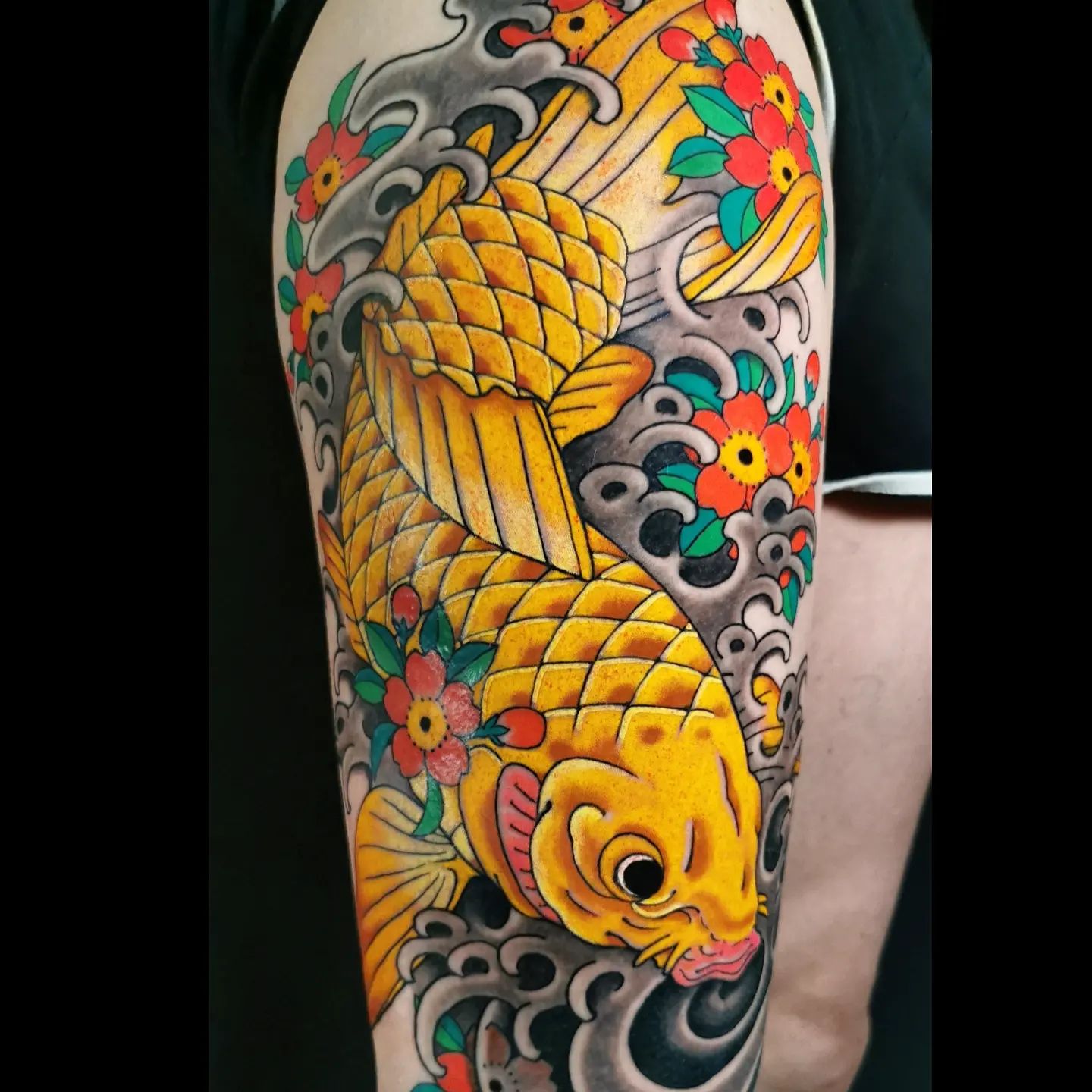 koi thigh tattoo by enzo barbarschi at crow temple studio norwich